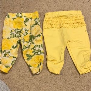 Two bottom yellow pants.